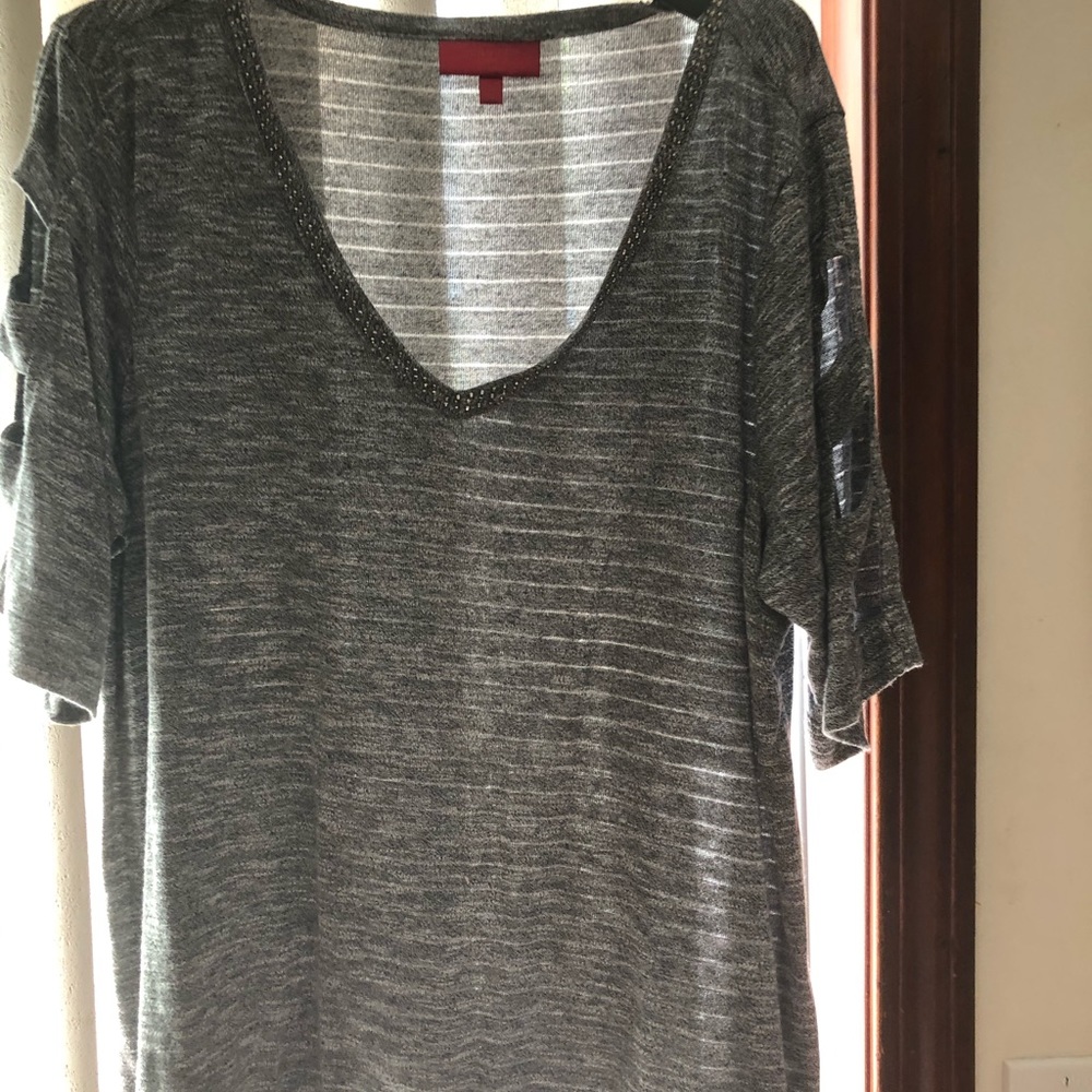 Gray blouse with a v- neck and a touch of sequence